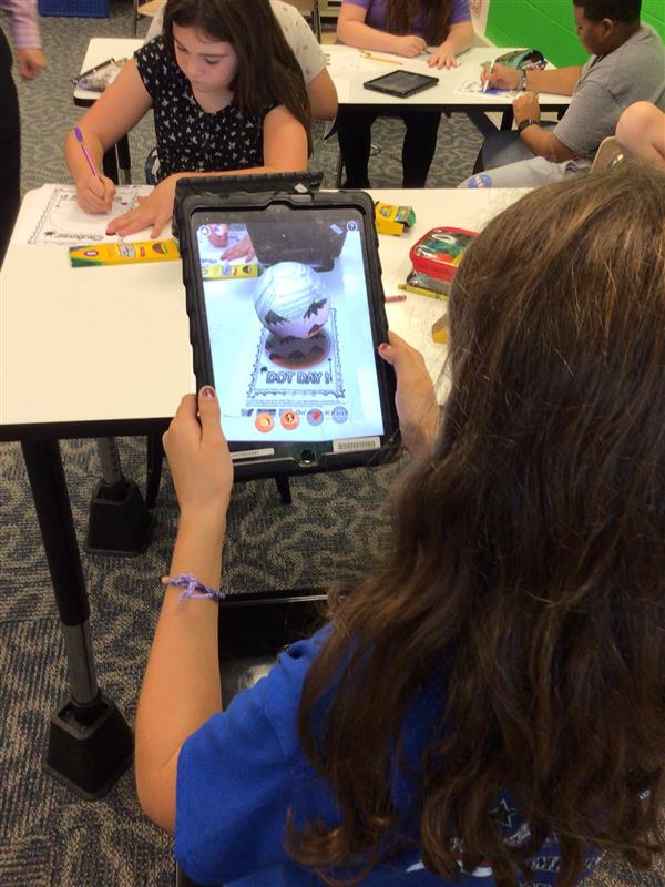 Photo of students using ipads